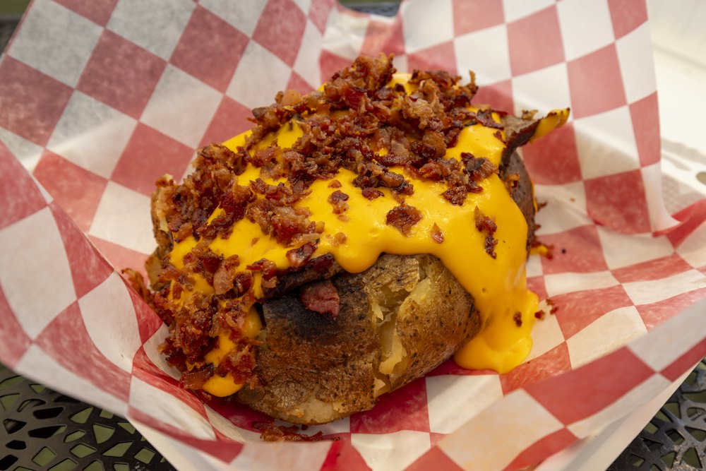 Stock photo of a loaded baked potato with cheese and bacon