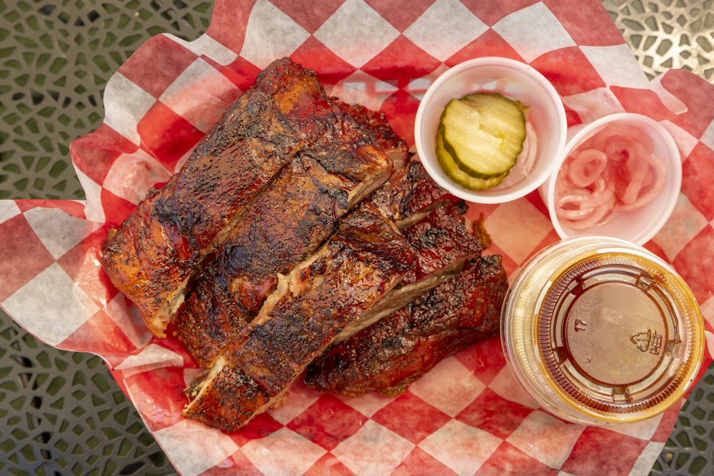 Stock photo of barbecue ribs with pickles